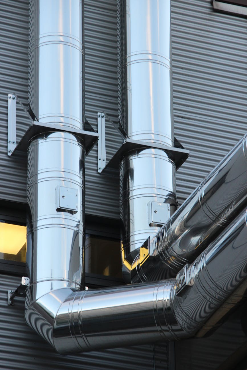 close up of machine part in factory Small Business Solutions That Can Save Your Company Thousands