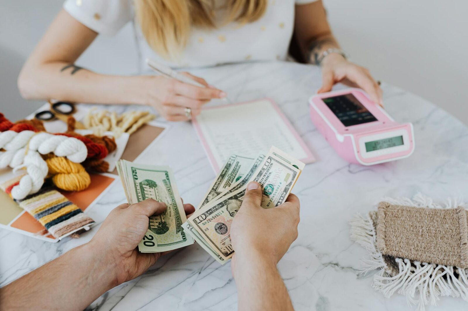 counting dollar bills The Business Hacks Every Entrepreneur Overlooks
