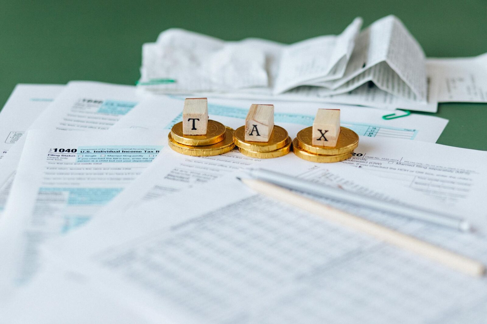 tax documents on the table The Business Hacks Every Entrepreneur Overlooks