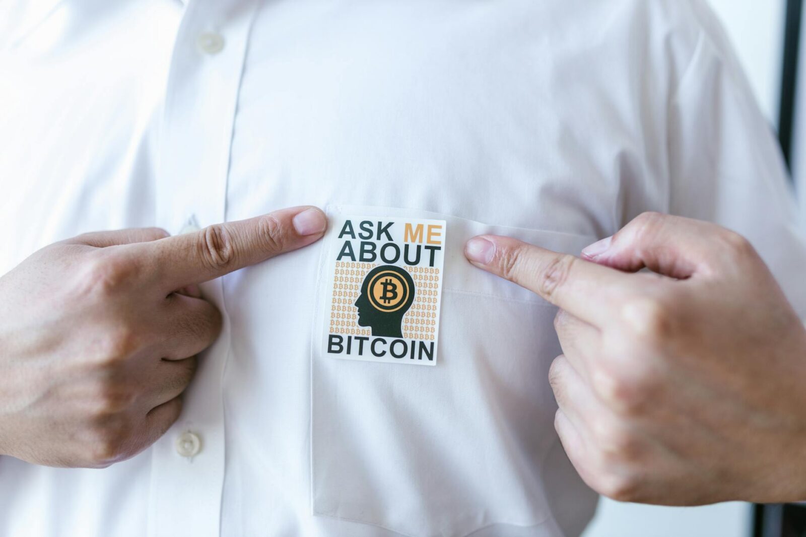 person in white button up shirt The Future of Crypto Tools for Small Businesses