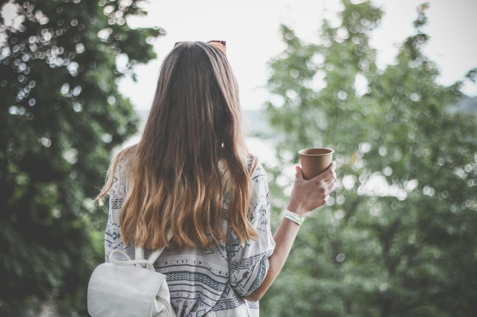woman holding brown paper cup 6 Empowering Ways to Reclaim How You Feel About Yourself