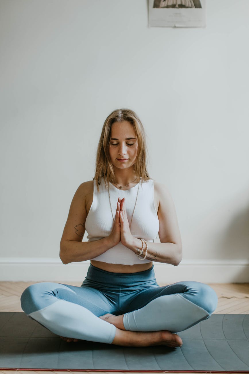 woman doing yoga inside a room Calming Techniques for When Your Thoughts Feel Out of Control