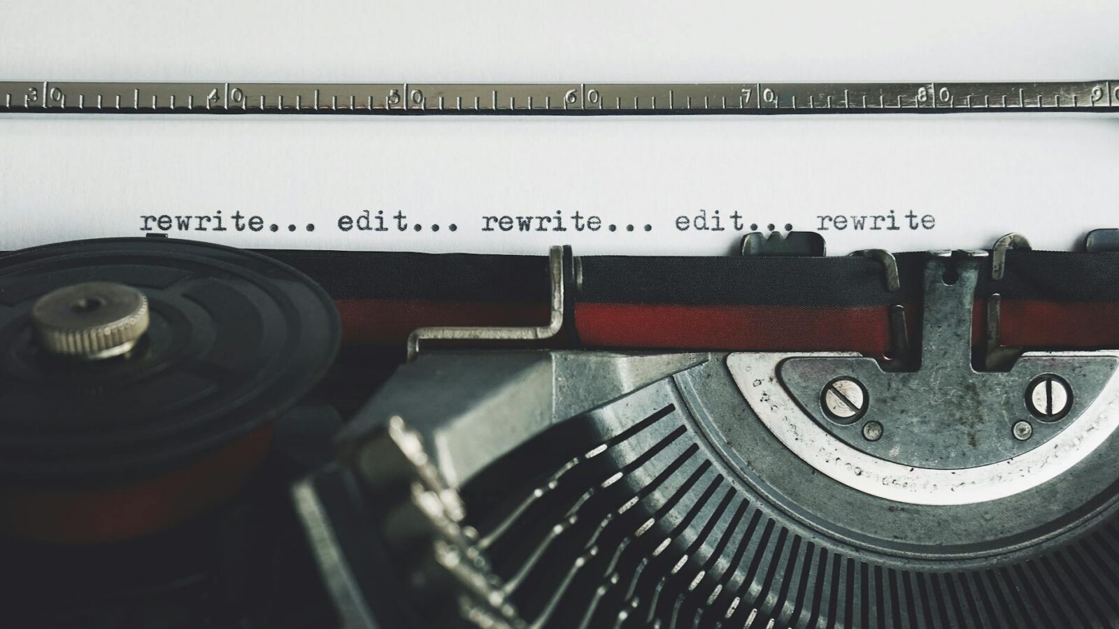 rewrite edit text on a typewriter 10 Steps to Build a Successful Writing Business
