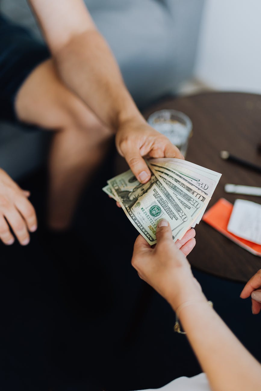 money handed over from hand to hand What Would You Do With $100,000? Tips From a Pro Investor Private Lending
