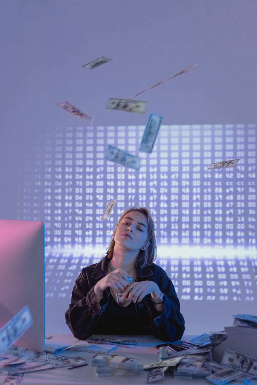 a confident woman holding bundles of cash money Financial Safety Nets When Life Throws Curveballs