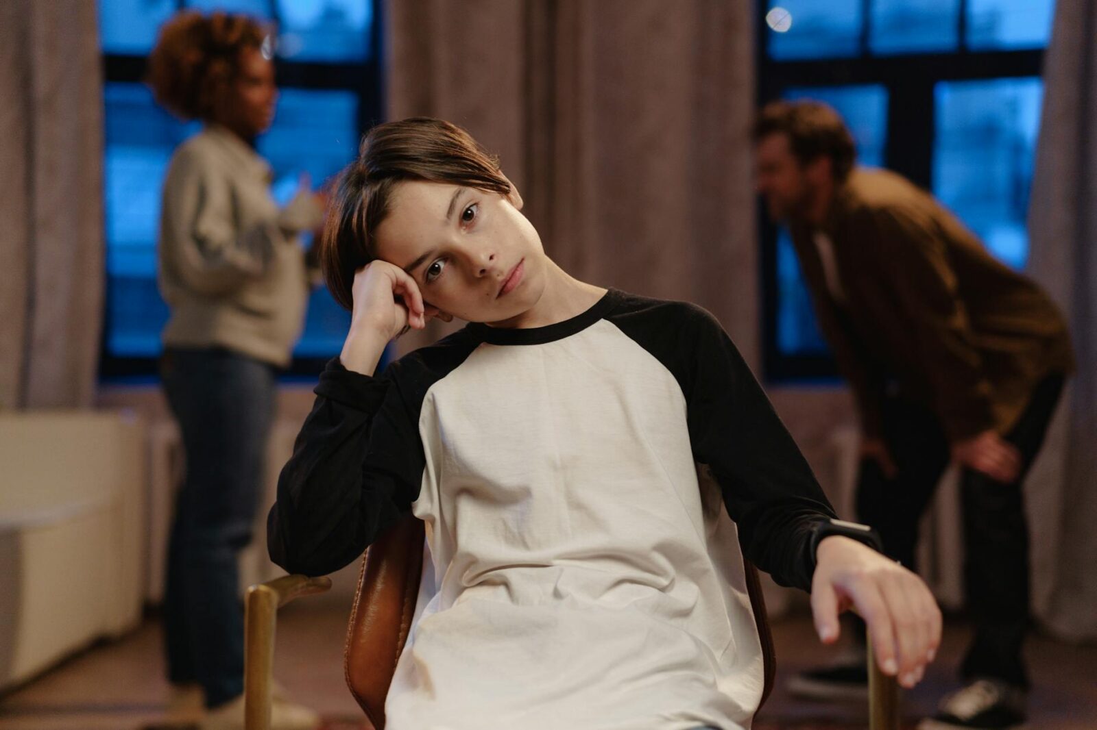 a boy sitting on a chair How to Navigate Divorce: Emotional, Legal, and Financial Realities