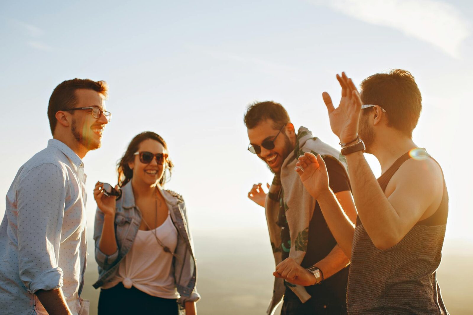 group of people having fun together under the sun 6 Empowering Ways to Reclaim How You Feel About Yourself