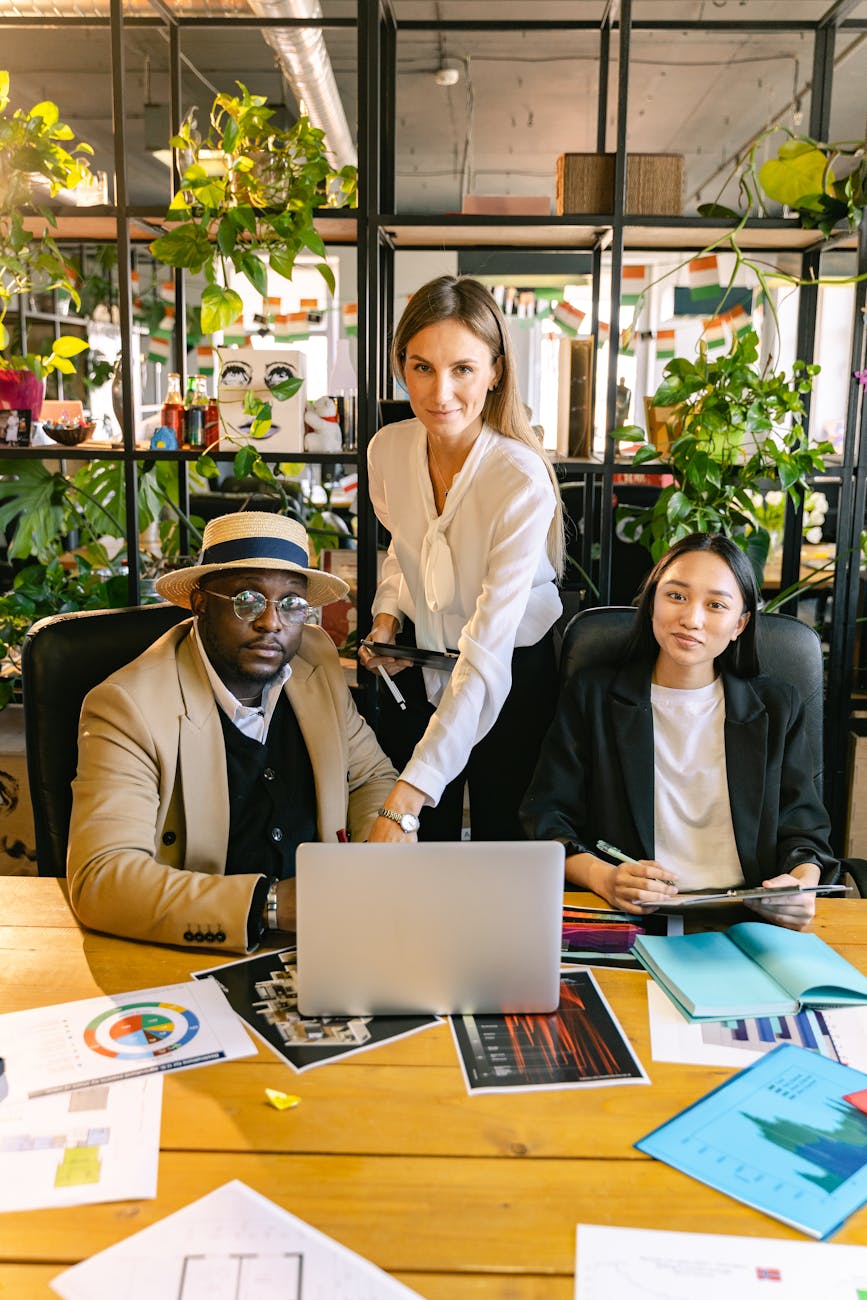 people in the office having a meeting How to Make Clients Feel Valued Before You Even Speak