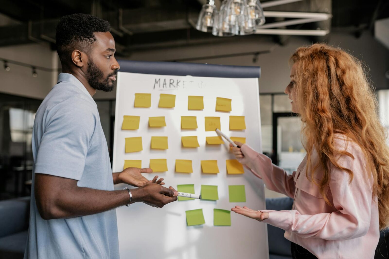 people having a meeting 3 Key Steps to Improve Marketing Efforts for Lasting Growth