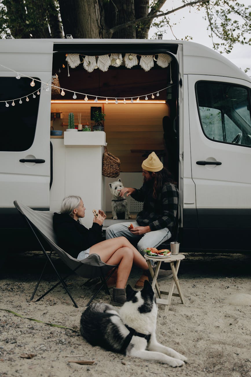woman in black sweater sitting on folding chair Road Trip Tips for Comfort and Adventure