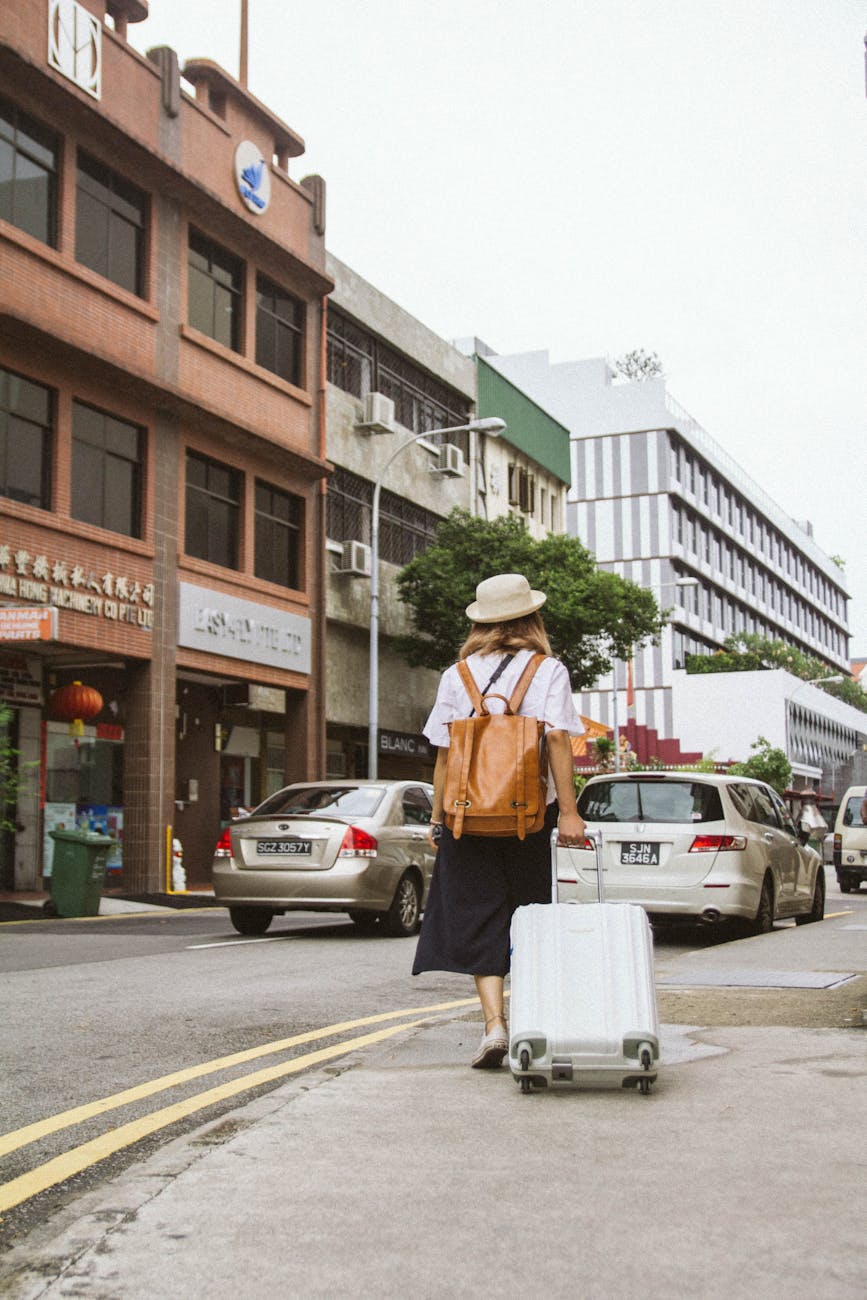 view of a woman on city street 6 Careers That Let You Travel and Work At The Same Time