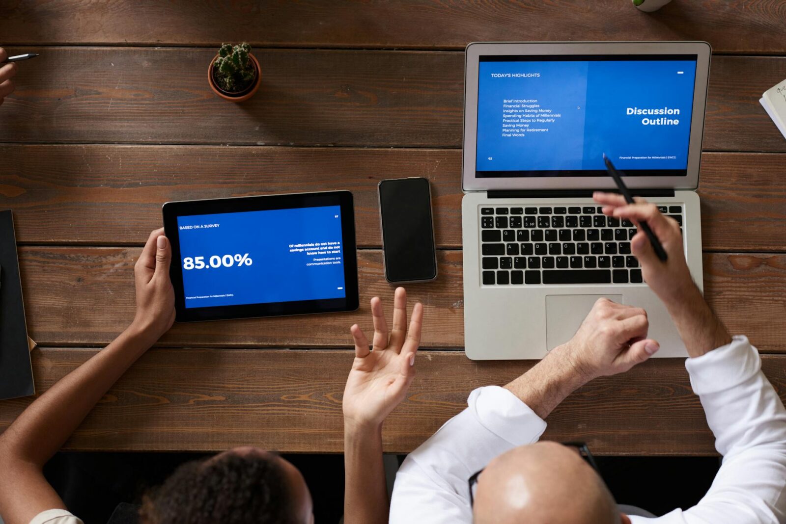 photo of people near wooden table Why Successful Businesses Break Down Plus 6 Ways to Prevent It