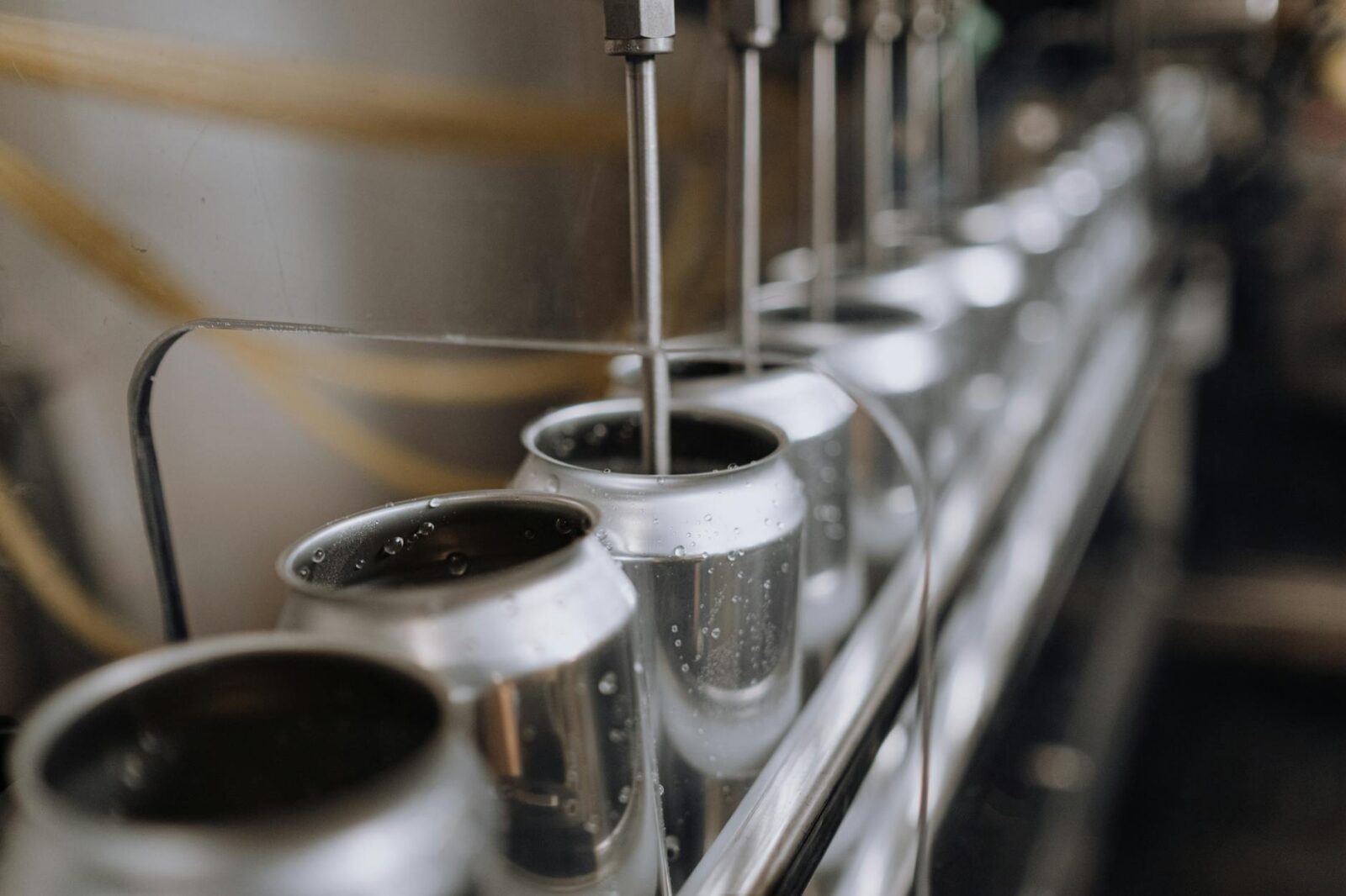 silver and black coffee cups Building a Sustainable Supply Chain: Lessons from the Industrial Sector