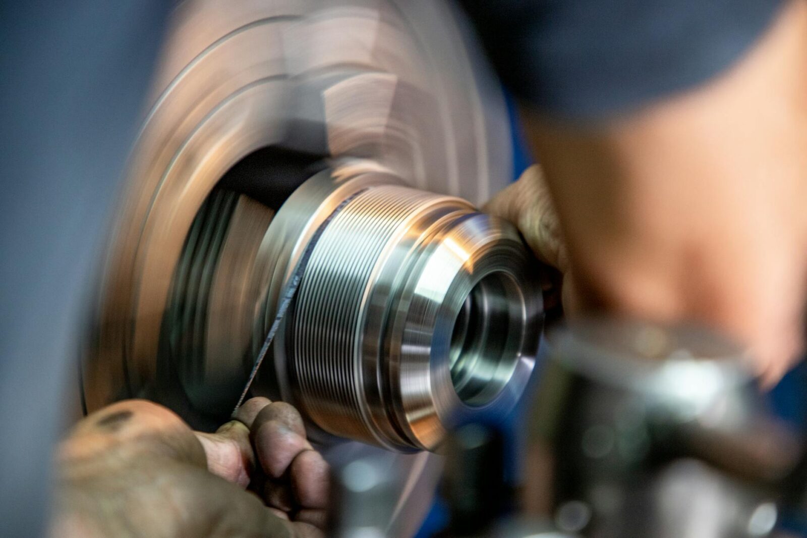 grinding of material on a grinder How Automation Is Transforming Heavy Metal Fabrication